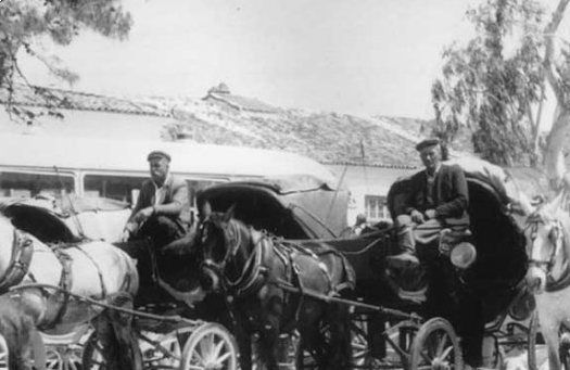 Grandfather in Agora (local Market area) waiting for a drive