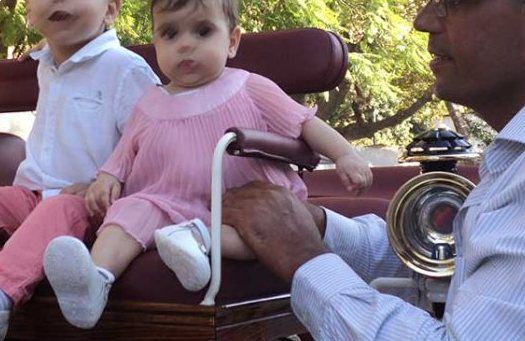 Child and baby having their picture taken